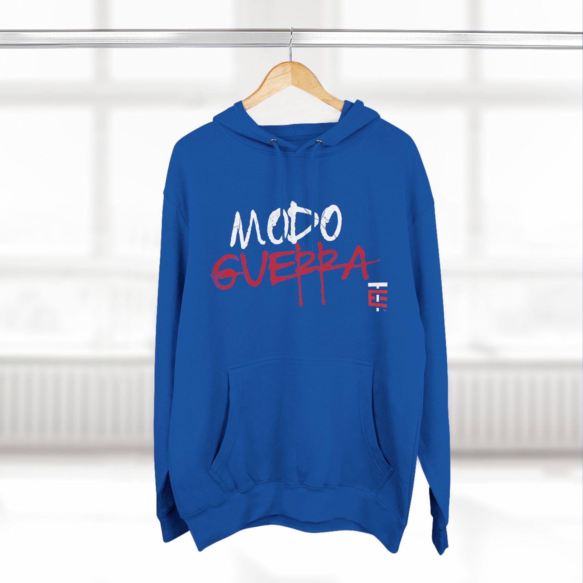 El Temach Hoodie, featuring bold red and white 'Modo Guerra' graphic with a cozy fleece lining. Sweater, Buzo. USA