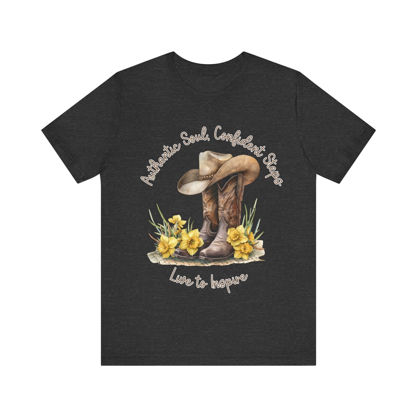 Brown leather cowboy boots with detailed stitching and a light brown hat on top, surrounded by green leaves and yellow flowers, with inspirational phrases ‘Authentic Soul,’ ‘Confident Steps,’ and ‘Live to Inspire’ written above and below on a white background Aqua Athletic Heather Baby Blue Black Dark Grey Heather Heather Kelly Heather Red Heather Team Purple Heather True Royal Navy Pink White Heather Aqua Heather Mauve Charity Pink.