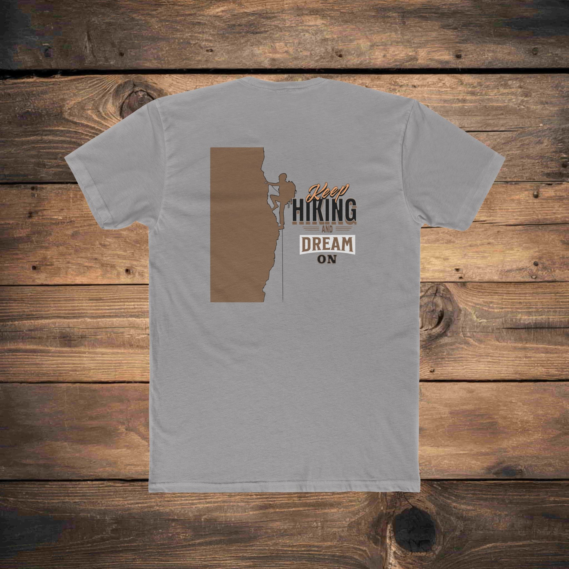 Hiking graphic tee with motivational typography and climber artwork, ideal for casual wear or outdoor exploration.