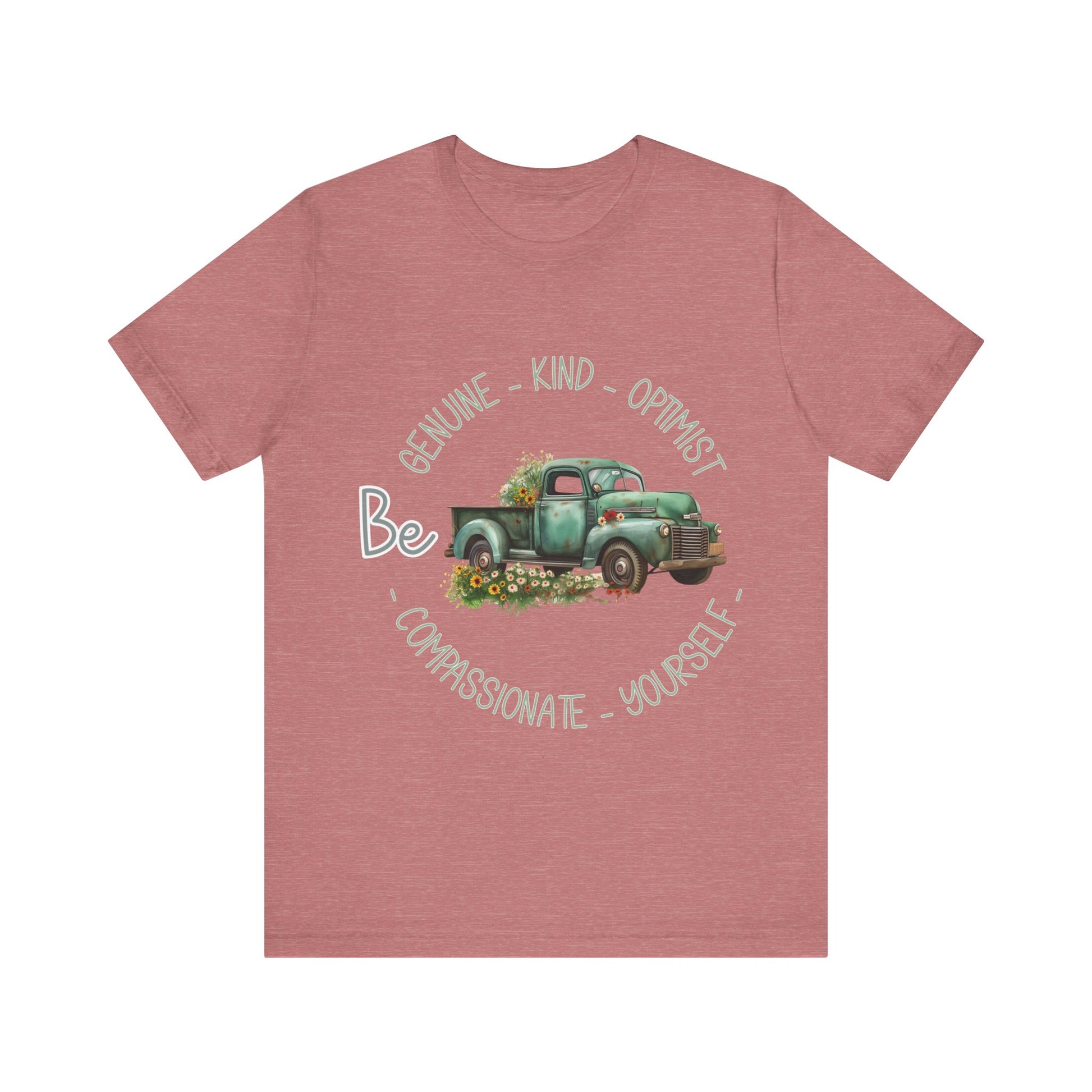 "Vintage green truck with floral decoration and inspirational words - featuring a classic old truck adorned with vibrant flowers on the sides, surrounded by the words 'Be genuine, bold, optimist, compassionate, kind, yourself', set in a beautiful context that promotes positivity and authenticity, color Aqua Athletic Heather Black Dark Grey Heather Heather Kelly Heather Navy Heather Red Heather True Royal Kelly Pink White Yellow Heather Aqua Heather Ice Blue Heather Mauve Charity Pink"