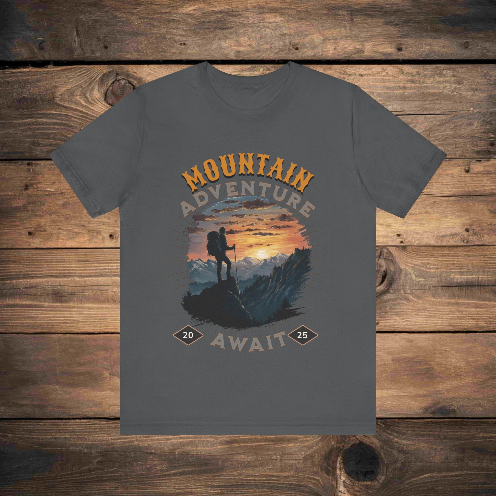 Adventure graphic tee in Ash with a detailed mountain sunset illustration, ideal for outdoor enthusiasts