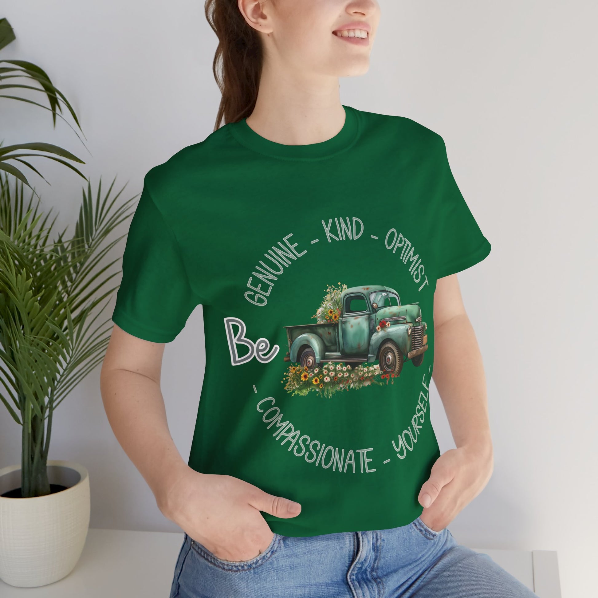 "Vintage green truck with floral decoration and inspirational words - featuring a classic old truck adorned with vibrant flowers on the sides, surrounded by the words 'Be genuine, bold, optimist, compassionate, kind, yourself', set in a beautiful context that promotes positivity and authenticity, color Aqua Athletic Heather Black Dark Grey Heather Heather Kelly Heather Navy Heather Red Heather True Royal Kelly Pink White Yellow Heather Aqua Heather Ice Blue Heather Mauve Charity Pink"