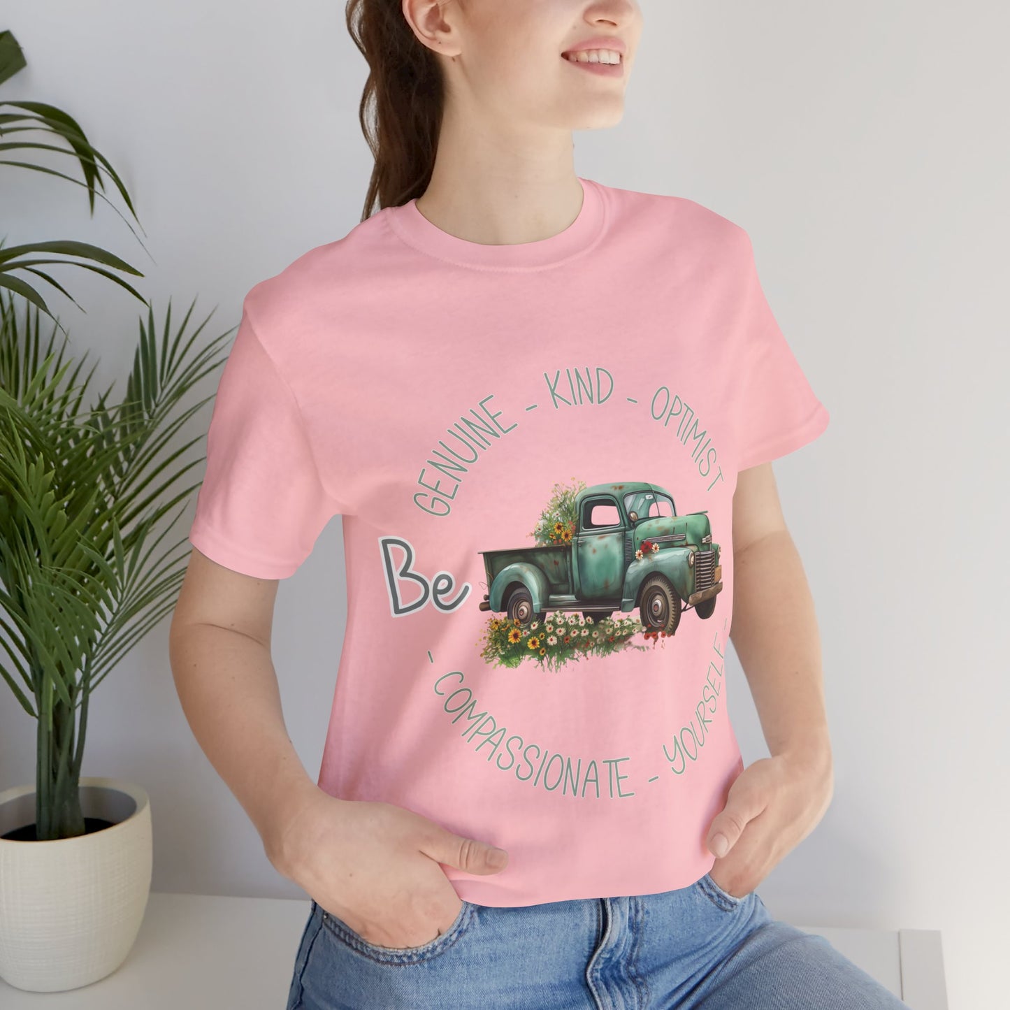 "Vintage green truck with floral decoration and inspirational words - featuring a classic old truck adorned with vibrant flowers on the sides, surrounded by the words 'Be genuine, bold, optimist, compassionate, kind, yourself', set in a beautiful context that promotes positivity and authenticity, color Aqua Athletic Heather Black Dark Grey Heather Heather Kelly Heather Navy Heather Red Heather True Royal Kelly Pink White Yellow Heather Aqua Heather Ice Blue Heather Mauve Charity Pink"