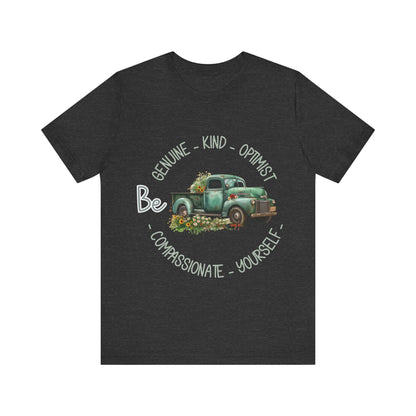 "Vintage green truck with floral decoration and inspirational words - featuring a classic old truck adorned with vibrant flowers on the sides, surrounded by the words 'Be genuine, bold, optimist, compassionate, kind, yourself', set in a beautiful context that promotes positivity and authenticity, color Aqua Athletic Heather Black Dark Grey Heather Heather Kelly Heather Navy Heather Red Heather True Royal Kelly Pink White Yellow Heather Aqua Heather Ice Blue Heather Mauve Charity Pink"