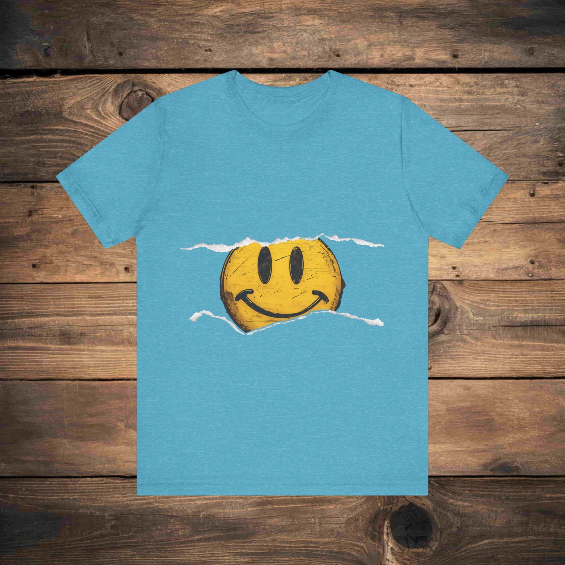 Vintage distressed yellow smiley face printed on a 100% cotton T-shirt, canvas 3001, known for its fresh and comfortable feel. This classic smiley design is available on T-shirts in the following colors: Aqua, Athletic Heather, Berry, Black, Dark Gray Heather, Heather Kelly, Heather Team Purple, Navy, and Heather Aqua.