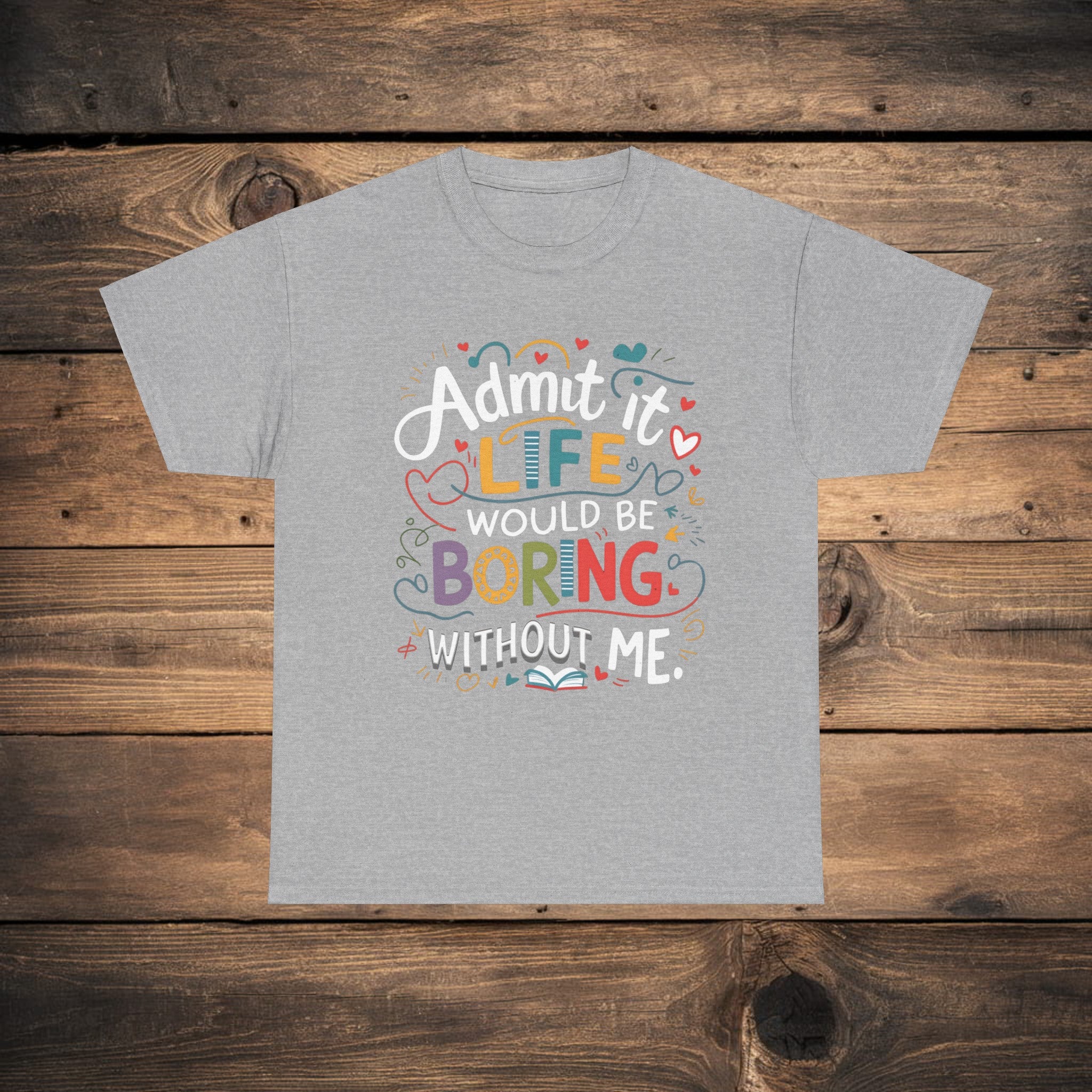 A collection of Bella Canvas 3001 for men and woman t-shirts in various colors (Dark Heather, Heliconia, Navy, Grid, Sport Gray, Black, and Graphite Heather) with the humorous text "Admit it, life would be boring without me" printed on the front.