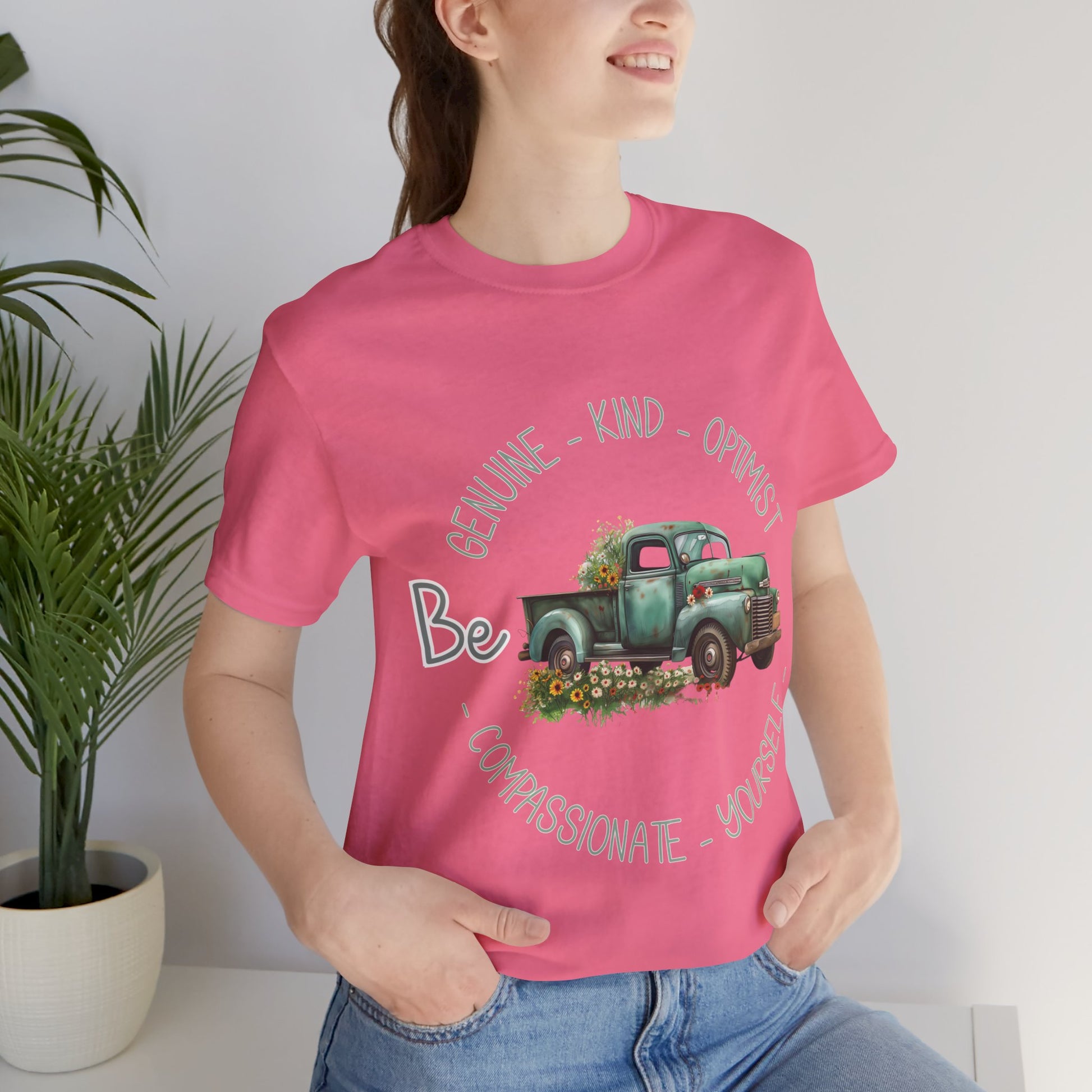 "Vintage green truck with floral decoration and inspirational words - featuring a classic old truck adorned with vibrant flowers on the sides, surrounded by the words 'Be genuine, bold, optimist, compassionate, kind, yourself', set in a beautiful context that promotes positivity and authenticity, color Aqua Athletic Heather Black Dark Grey Heather Heather Kelly Heather Navy Heather Red Heather True Royal Kelly Pink White Yellow Heather Aqua Heather Ice Blue Heather Mauve Charity Pink"