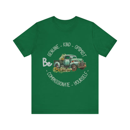 "Vintage green truck with floral decoration and inspirational words - featuring a classic old truck adorned with vibrant flowers on the sides, surrounded by the words 'Be genuine, bold, optimist, compassionate, kind, yourself', set in a beautiful context that promotes positivity and authenticity, color Aqua Athletic Heather Black Dark Grey Heather Heather Kelly Heather Navy Heather Red Heather True Royal Kelly Pink White Yellow Heather Aqua Heather Ice Blue Heather Mauve Charity Pink"