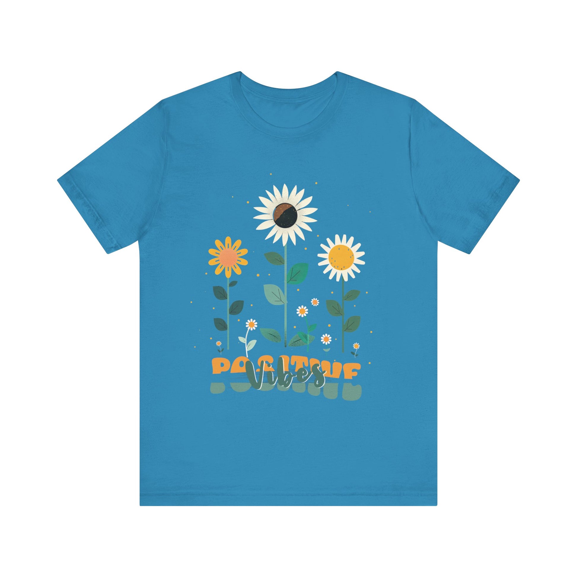 Colorful floral illustration with 'Positive Vibes' - featuring a trio of vibrant flowers, including a sunflower-like bloom with white petals, an orange flower with simple petals, and a yellow flower with round petals, all set against a light backdrop adorned with whimsical dots and the uplifting phrase 'Positive Vibes' in playful orange font, Aqua, Athletic Heather, Berry, Black, Dark Grey, Dark, Grey, Heather, Heather Kelly, Heather Red, Heather Team, Purple, Navy, Pink, Ash, Heather, Aqua, Charity Pink