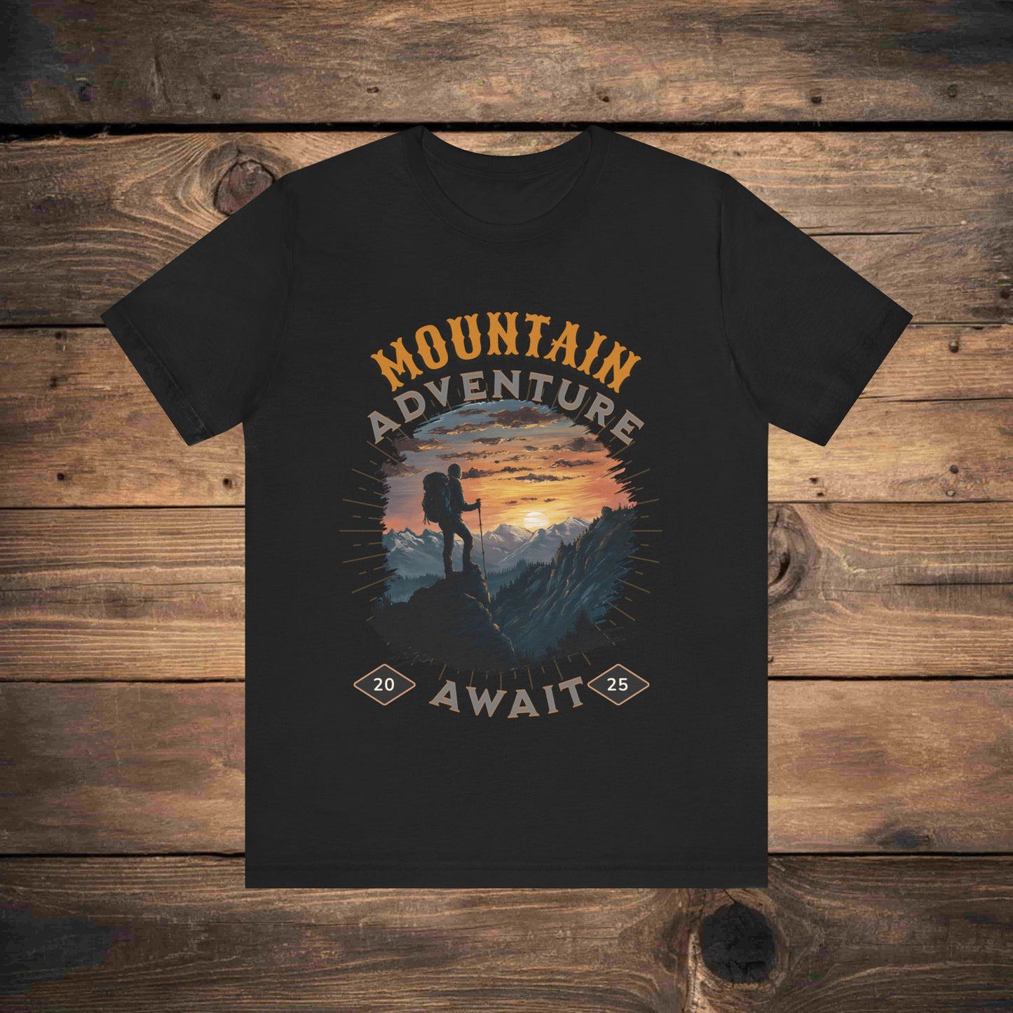 Adventure graphic tee in dark grey  with a detailed mountain sunset illustration, ideal for outdoor enthusiasts