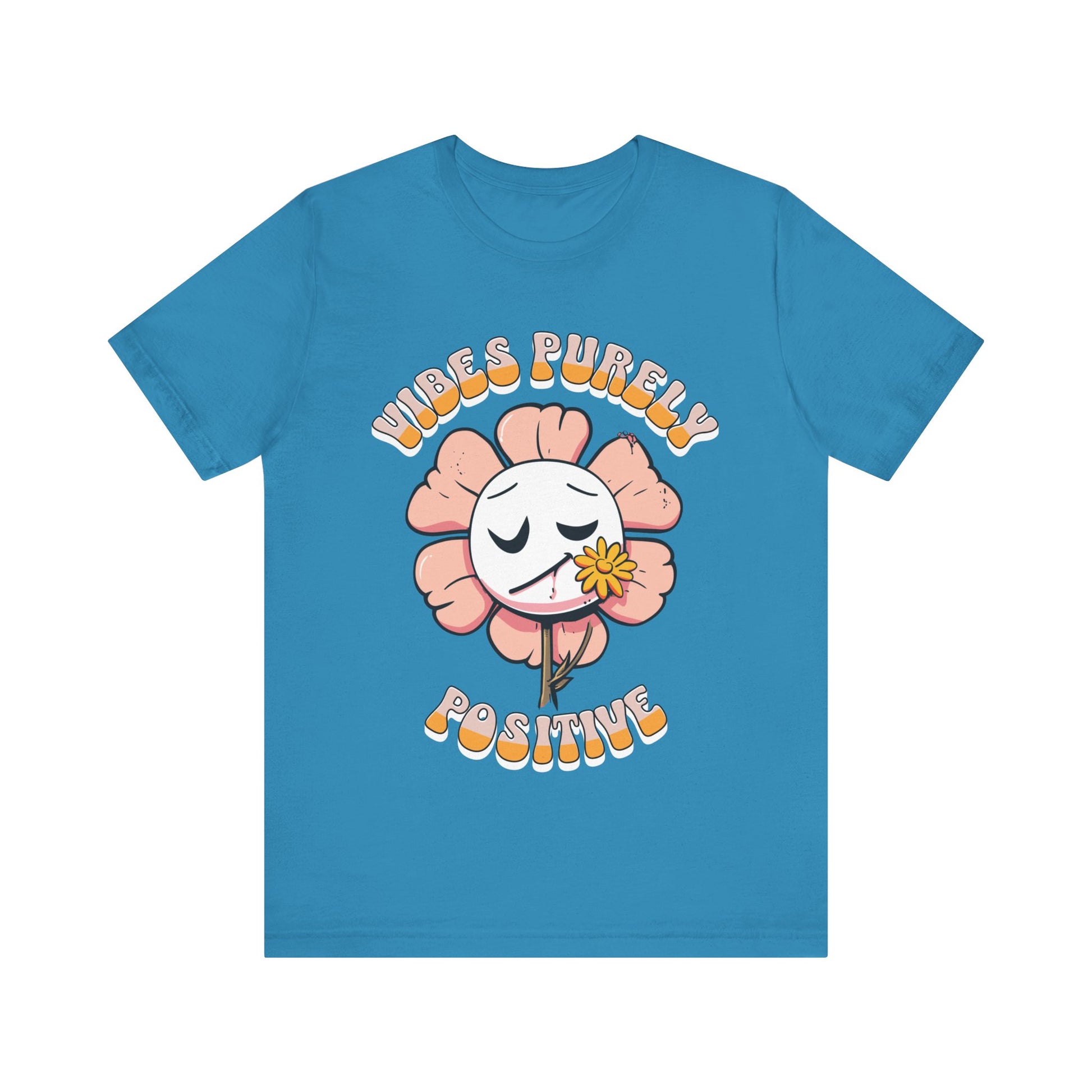 Cute pink flower with a smiling face and a yellow flower in its mouth, accompanied by the text "Vibes Purely Positive." This cheerful design is perfect for t-shirts available in colors Aqua, Berry, Black, Dark Gray, Heather Kelly, Heather Team Purple, Heather True Royal, Navy, White, and Charity Pink.