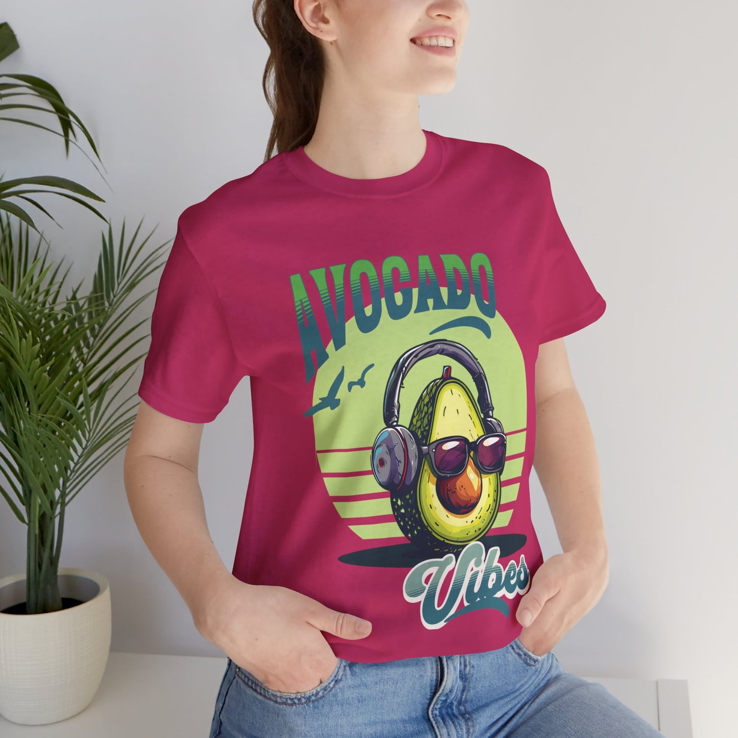 Avocado with headphones and glasses design on Bella Canvas 3001 T-shirt available in Aqua, Athletic Heather, Berry, Black, Dark Grey Heather, Heather Kelly, Heather Navy, Heather Red, Heather Team Purple, Navy, True Royal, White, Heather Aqua.