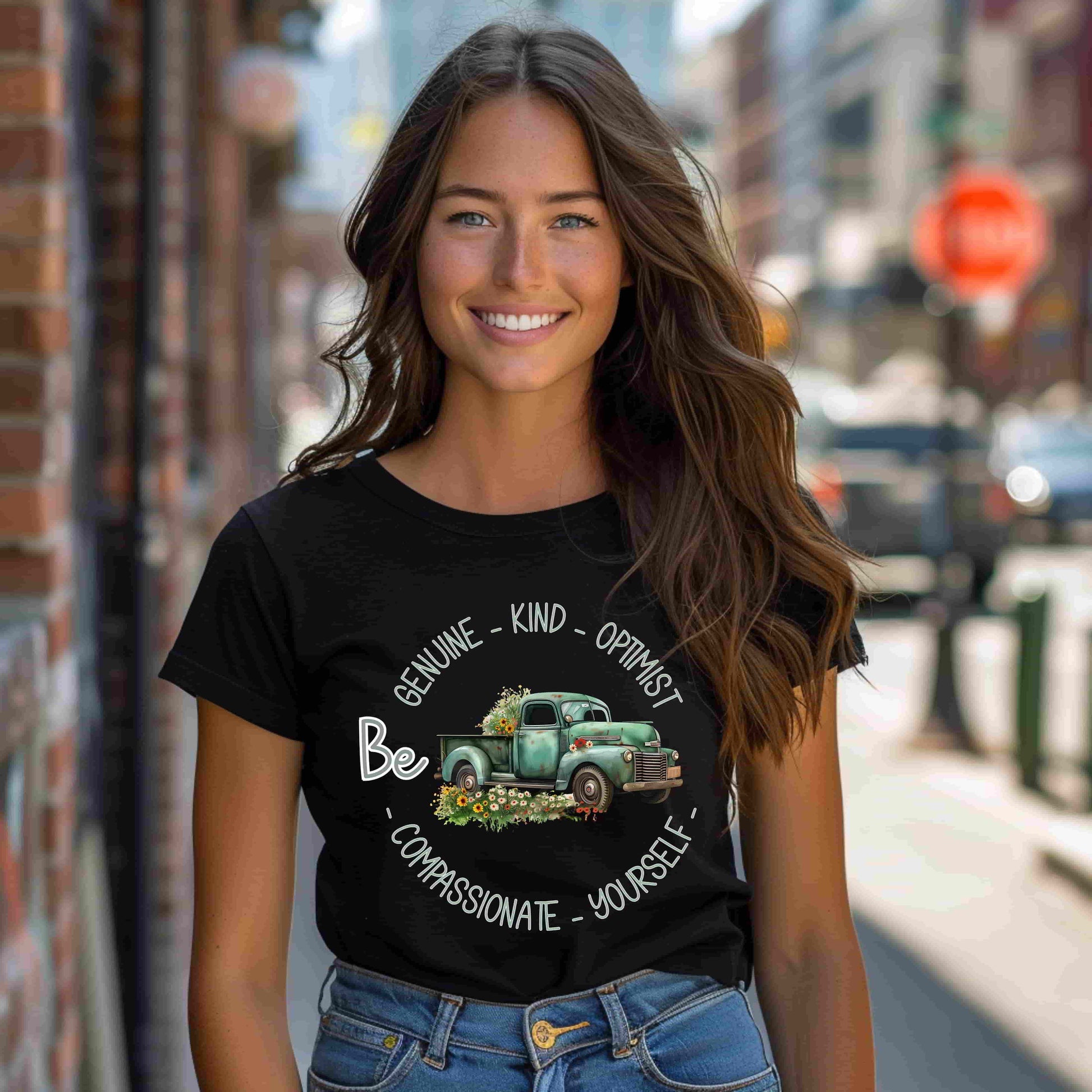 Vintage boho-style illustration of an old green truck surrounded by colorful flowers, with the text 'Be Genuine - Bold - Optimistic - Compassionate - Kind - Yourself.' This design is intended for t-shirts in various colors, including Aqua, Athletic Heather, Black, Dark Grey Heather, Heather Kelly, Heather Navy, Heather Red, Heather True Royal, Kelly, Pink, White, Yellow, Heather Aqua, Heather Ice Blue, Heather Mauve, and Charity Pink.