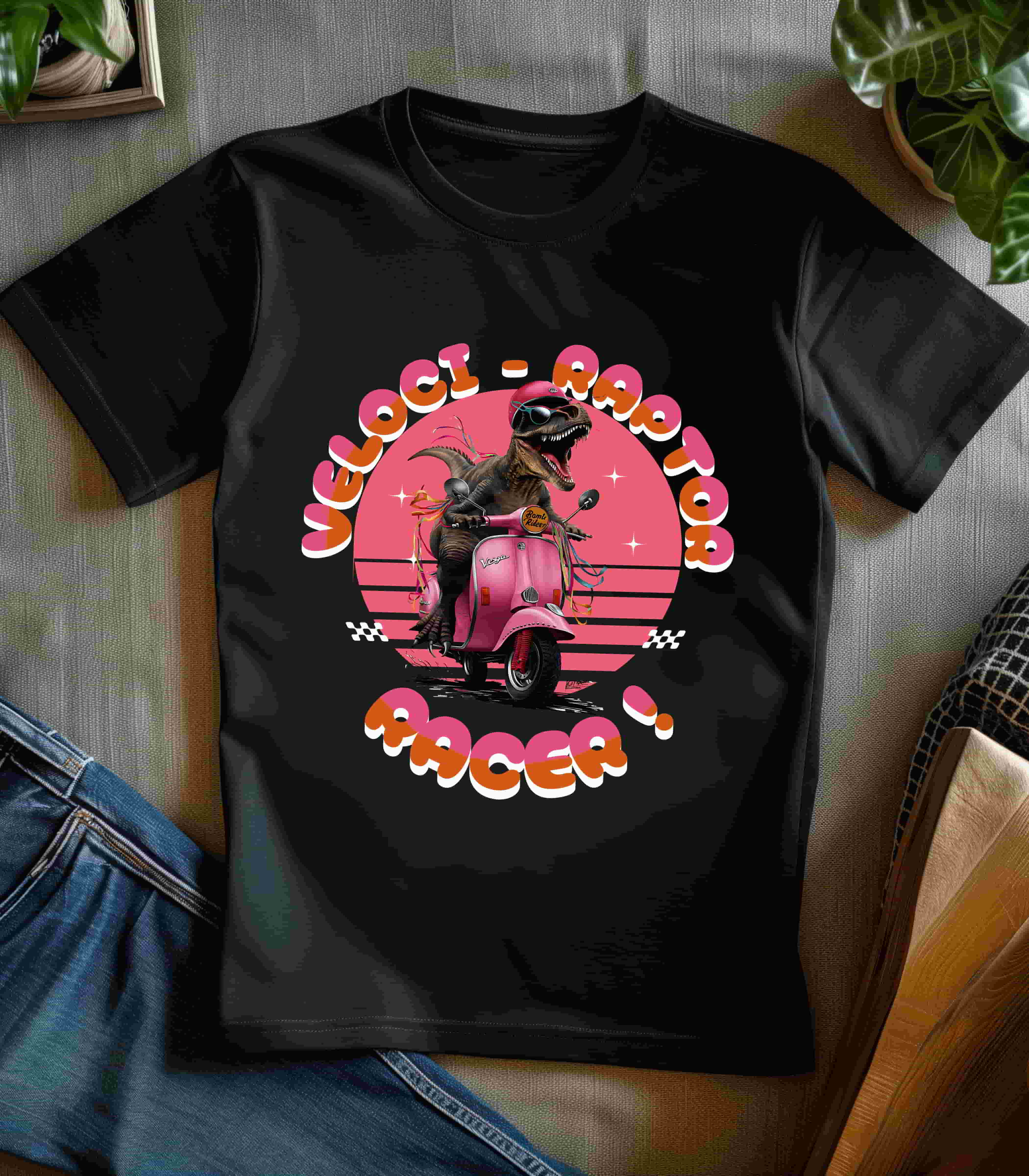 The Design is a Whimsical funny velociraptor riding a pink Vespa scooter with ‘VELOCI-RAPTOR RACER!’ in bold orange-red text on a circular gradient pink, printed in a t-shirt in those colors: Athletic Heather Baby Blue Berry Black Dark Grey Heather Heather Navy Navy Pink Steel Blue White Ash Heather Aqua Charity Pink.